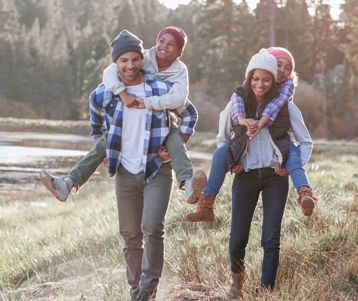 a family walking an outdoor trail
