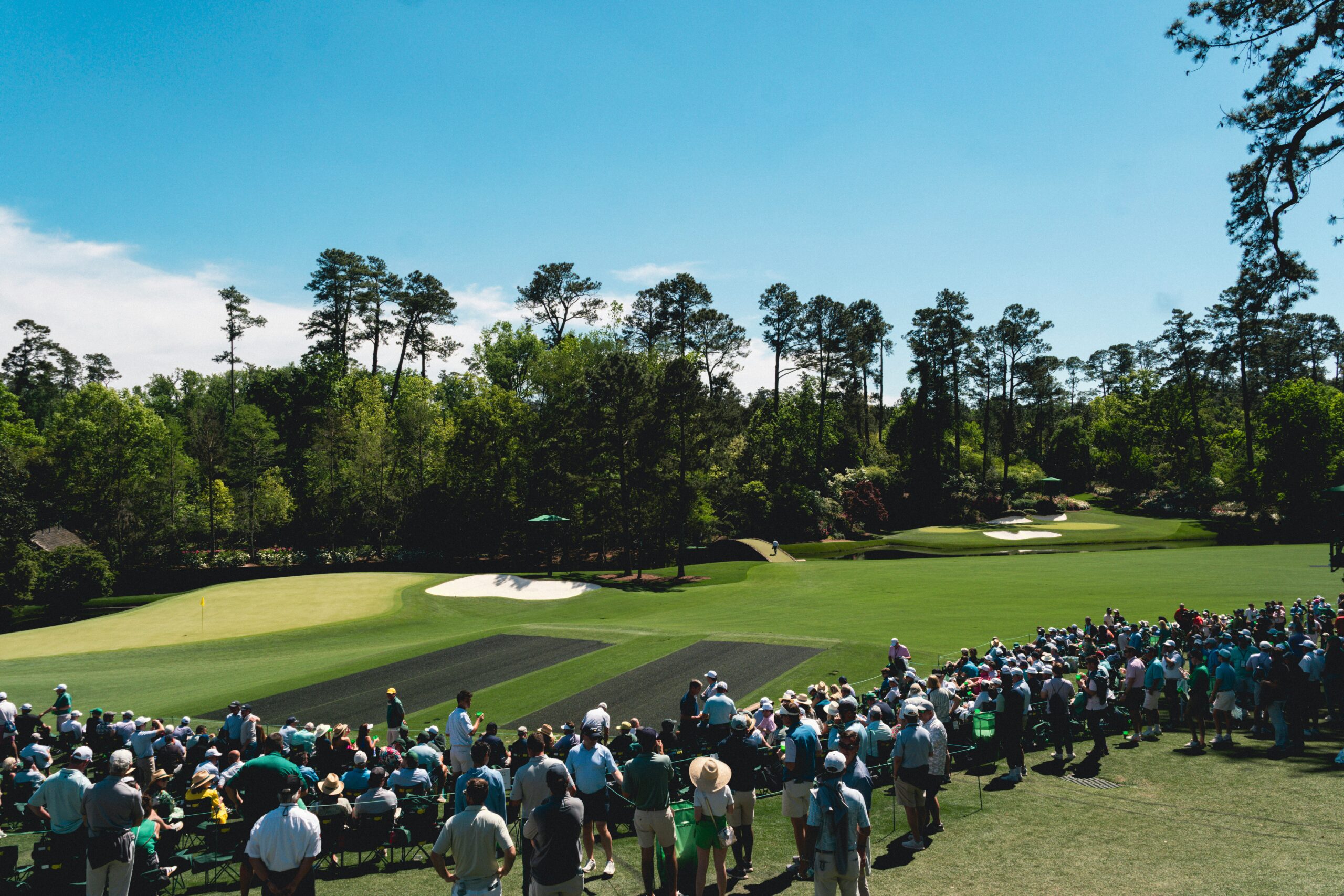 photo of spectators on a golf course